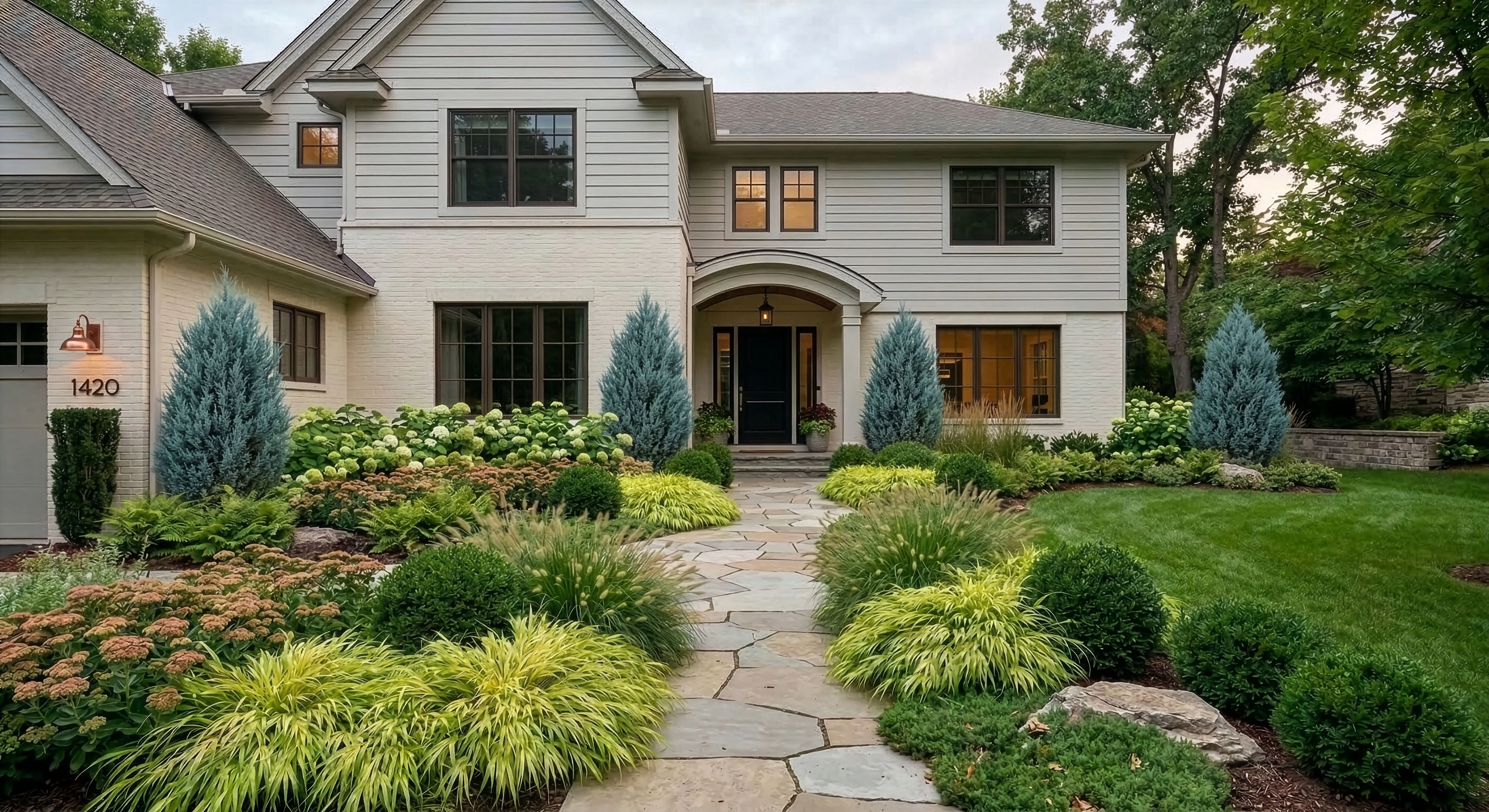 Evergreen Foundation front yard with structured year-round plantings